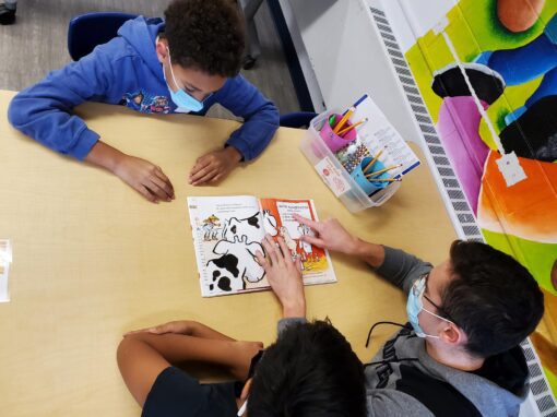 Reading to children at books for buckets program in Lake Bluff, IL