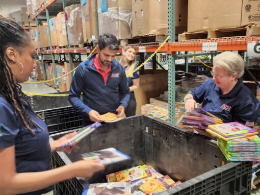 Rose employees volunteering at bernie's book bank in lake bluff il