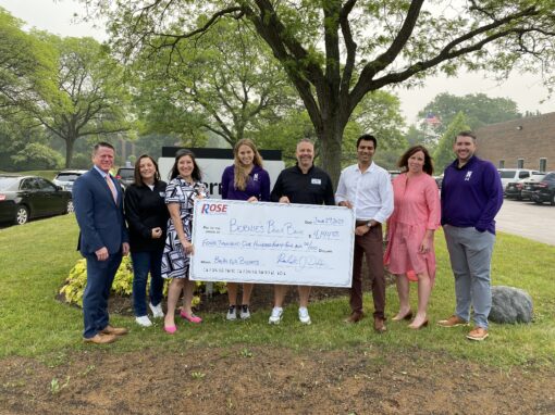 Rose Books for Buckets check presentation at Bernie's Book Bank