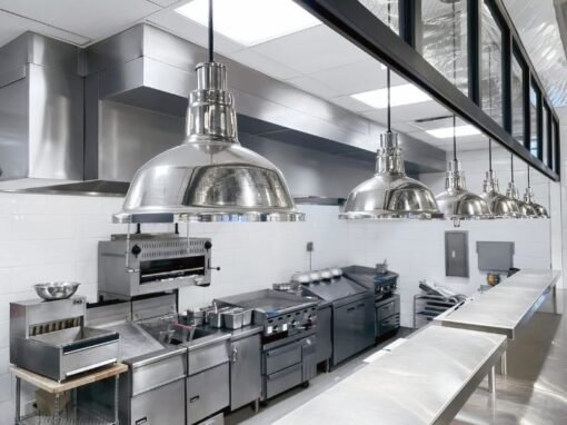 Stainless steel and appliances in clean kitchen with pests prevented by Rose Pest Solutions